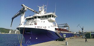 Fish feed weighing at sea