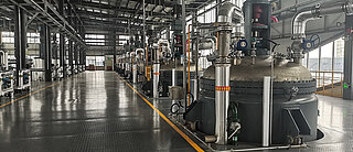 Picture of storage and metering tanks at Dongyue Group’s production site