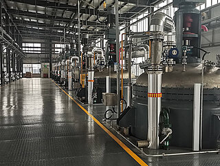 Picture of storage and metering tanks at Dongyue Group’s production site