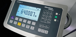 Use of Combics 3 for precise counting and weighing in the clean room