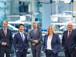 Gruppenbild des Management Teams von Minebea Intec 